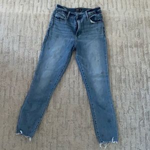 Slightly worn jeans with stars